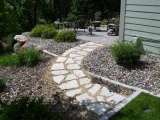 Flagstone path with rock and mulch